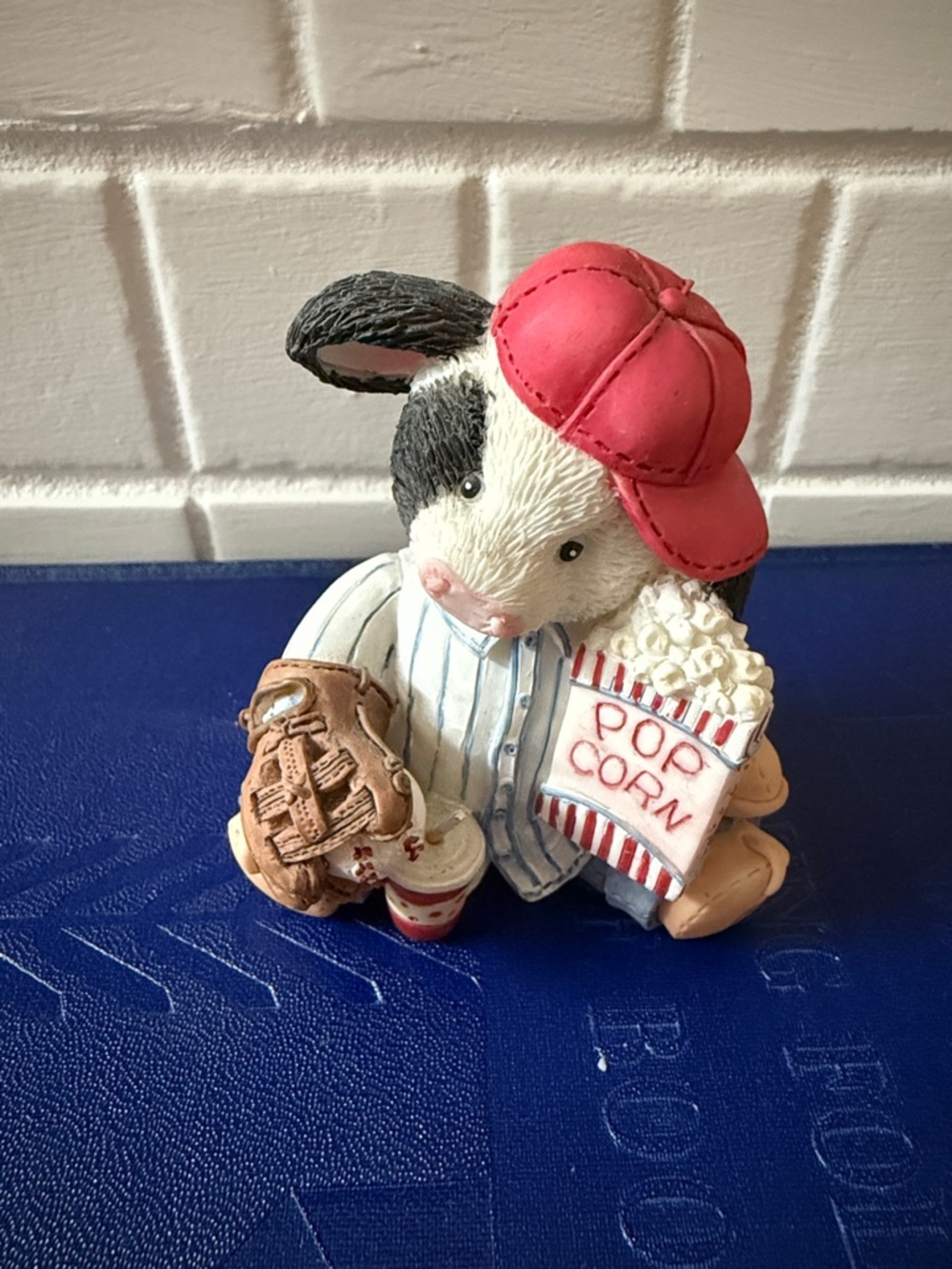 Mary Moo Moos. “Take me out to the bull game”